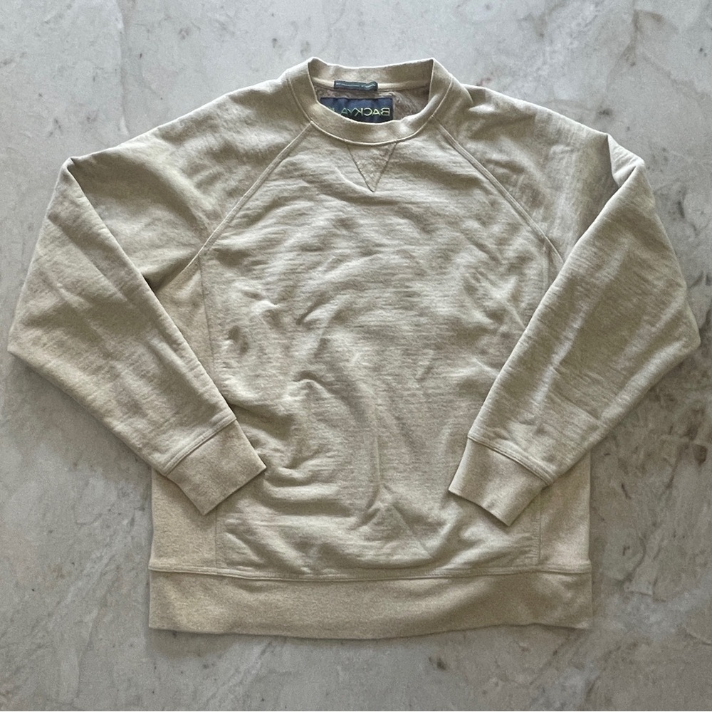 Cream crewneck sweatshirt